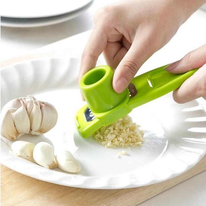 https://smartkitchen-kc.com/cdn/shop/products/302915-1Pcs-Stainless-Garlic-Press-Household-Manual-Garlic-Press-Device-Kitchen-Press-Squeezer-Ginger-Garlic-Tools-Kitchen_1024x1024.jpg?v=1624040675